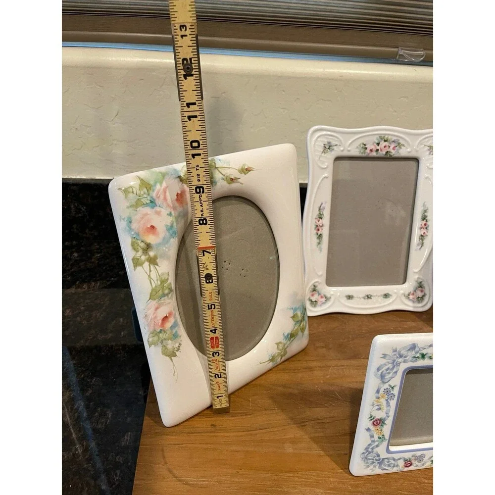 4 vintage floral ceramic photo frames